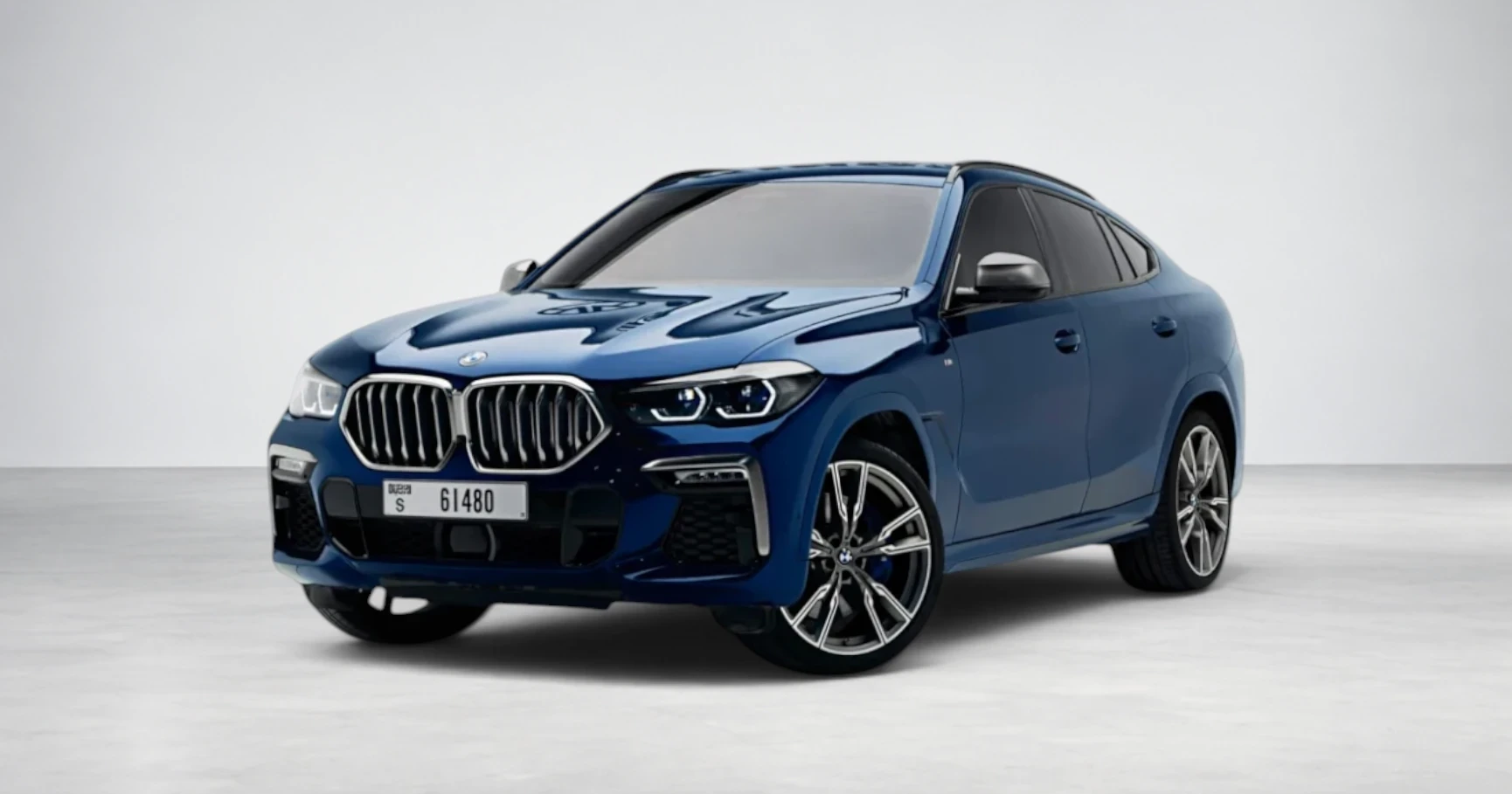 BMW X6 M50i — Phytonic Blue luxury rental Dubai